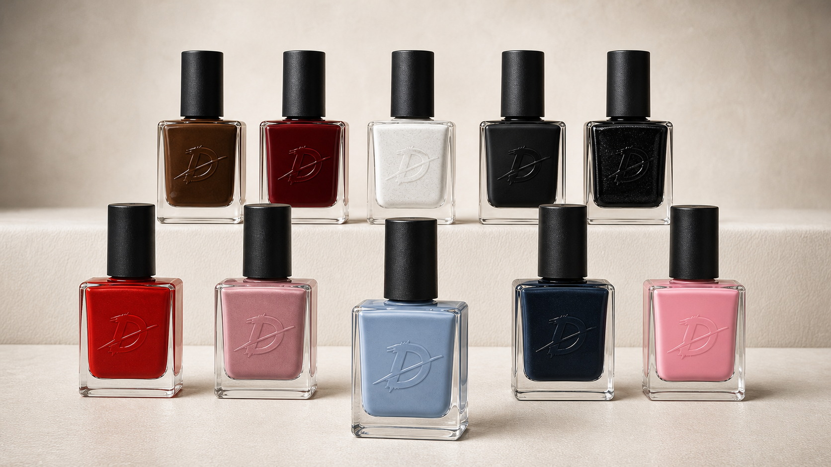 Realistic Defiant nail polish bottle renders in ten launch colors
